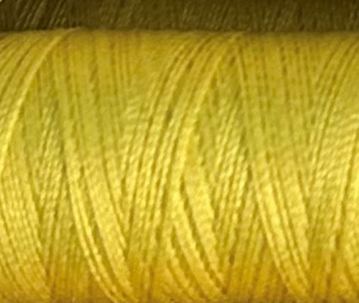 a spool of sunny yellow Gütermann Maraflex stretch thread