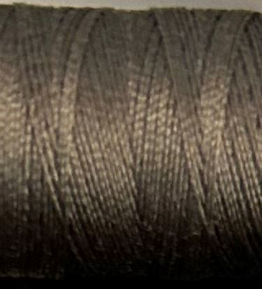a spool of dark taupe Gütermann Maraflex stretch thread