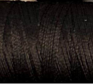 a spool of dark brown Gütermann Maraflex stretch thread