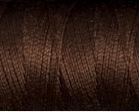 a spool of brown Gütermann Maraflex stretch thread