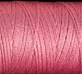a spool of rose pink Gütermann Maraflex stretch thread