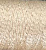 a spool of lgiht beige Gütermann Maraflex stretch thread