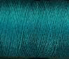 a spool of teal Gütermann Maraflex stretch thread