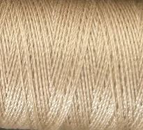 a spool of neutral beige Gütermann Maraflex stretch thread