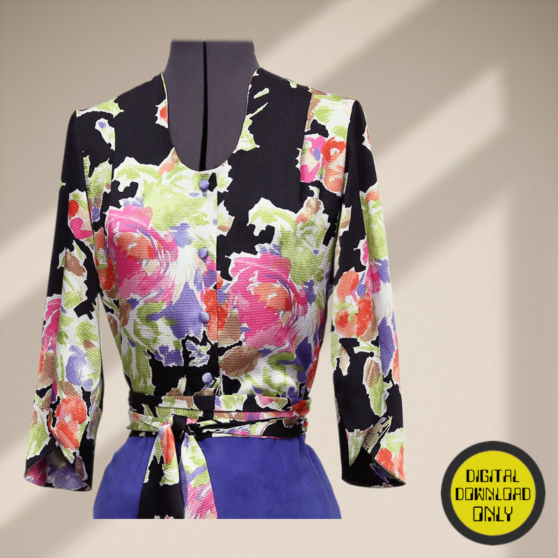 A designer jacket on a mannequin with bold colors of black, purple, pink and green