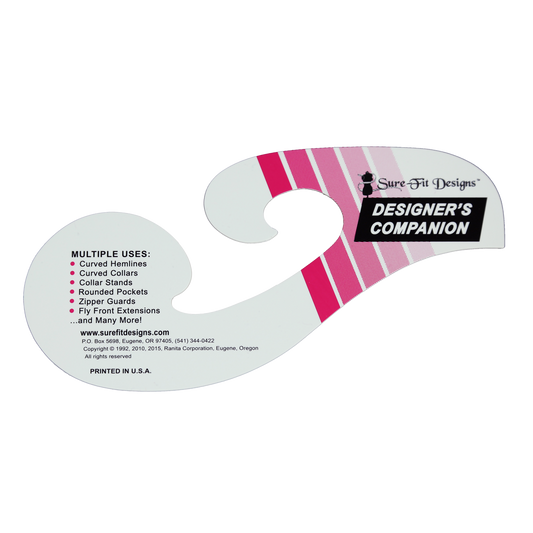 Sure Fit Designs Designer's Companion.   white plastic curvy ruler with fuscia colored diagonal stripes used for sewing pattern making
