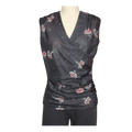 A digital sewing pattern for a cross over top.  The garment is a dark gray sleeveless top with floral patterns on a mannequin against a transparent background